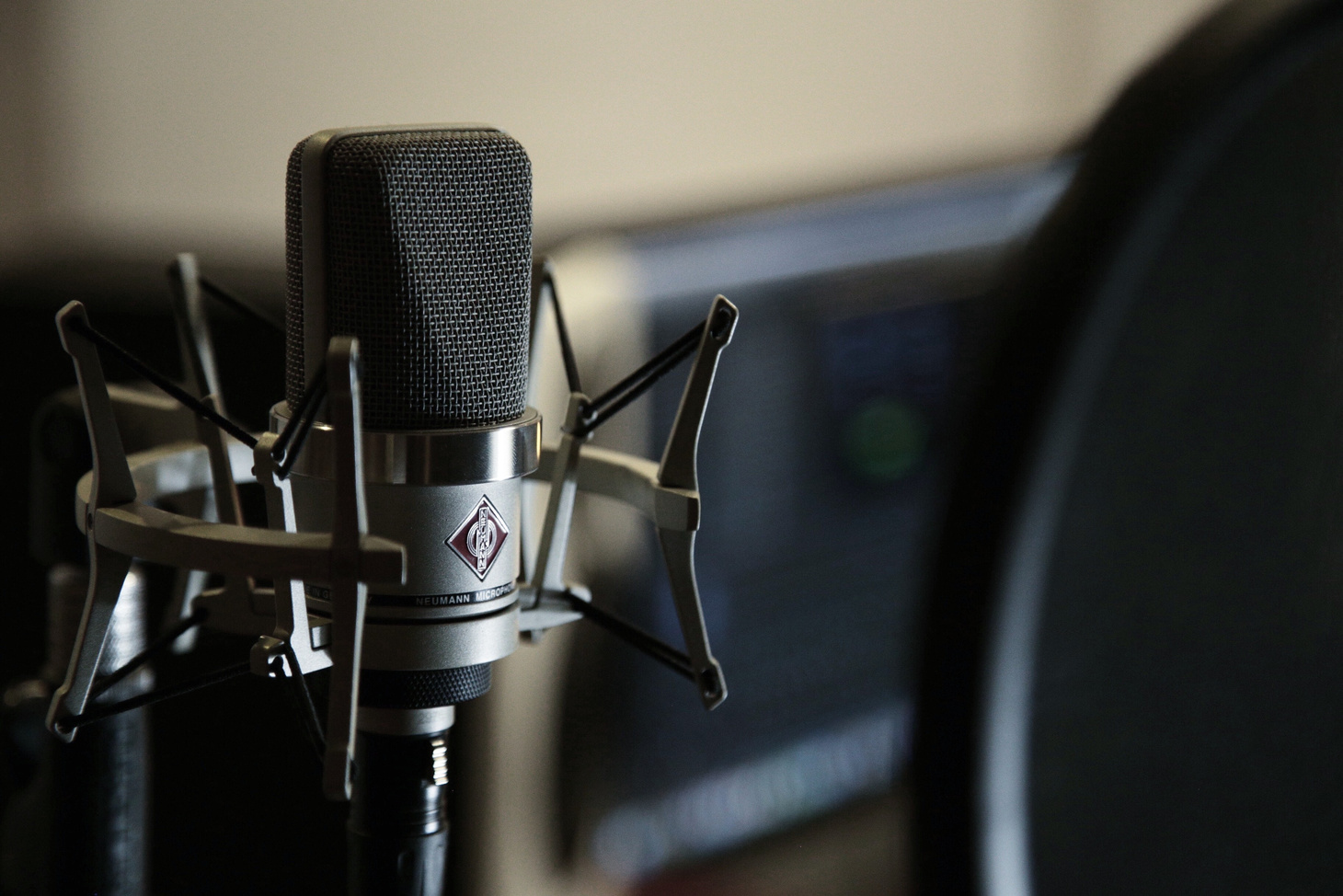 a close up of a microphone in a recording studio.